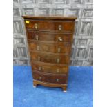 A BURR WALNUT BOW FRONTED CHEST OF SIX DRAWERS