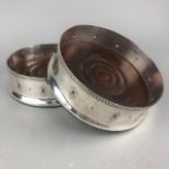 A PAIR OF SILVER CIRCULAR WINE SLIDES