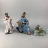 A CHINESE CERAMIC FIGURE OF A SCHOLAR AND FOUR OTHER FIGURES