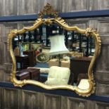 A MODERN WALL MIRROR IN A GILT FRAME