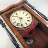 AN EDWARDIAN INLAID MAHOGANY WALL CLOCK