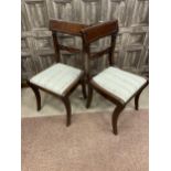 A SET OF FOUR REGENCY MAHOGANY DINING CHAIRS