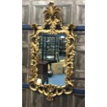 A REPRODUCTION GILT WOOD WALL MIRROR