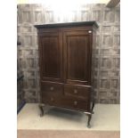 AN INLAID MAHOGANY CUPBOARD CHEST