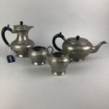 A 20TH CENTURY HAMMERED PETWER FOUR PIECE TEA SERVICE