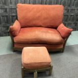 AN ERCOL TWO SEA SETTEE AND A FOOTSTOOL