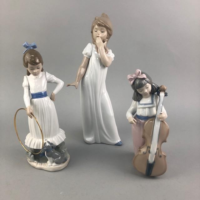 A NAO FIGURE GROUP OF A BRIDE AND GROOM AND OTHER FIGURES