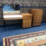 A RETRO DRESSING TABLE AND A CHEST OF DRAWERS