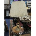 A GILT TABLE LAMP