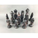 A PAINTED PLASTER CHESS SET