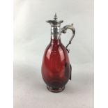 A RUBY GLASS CLARET JUG