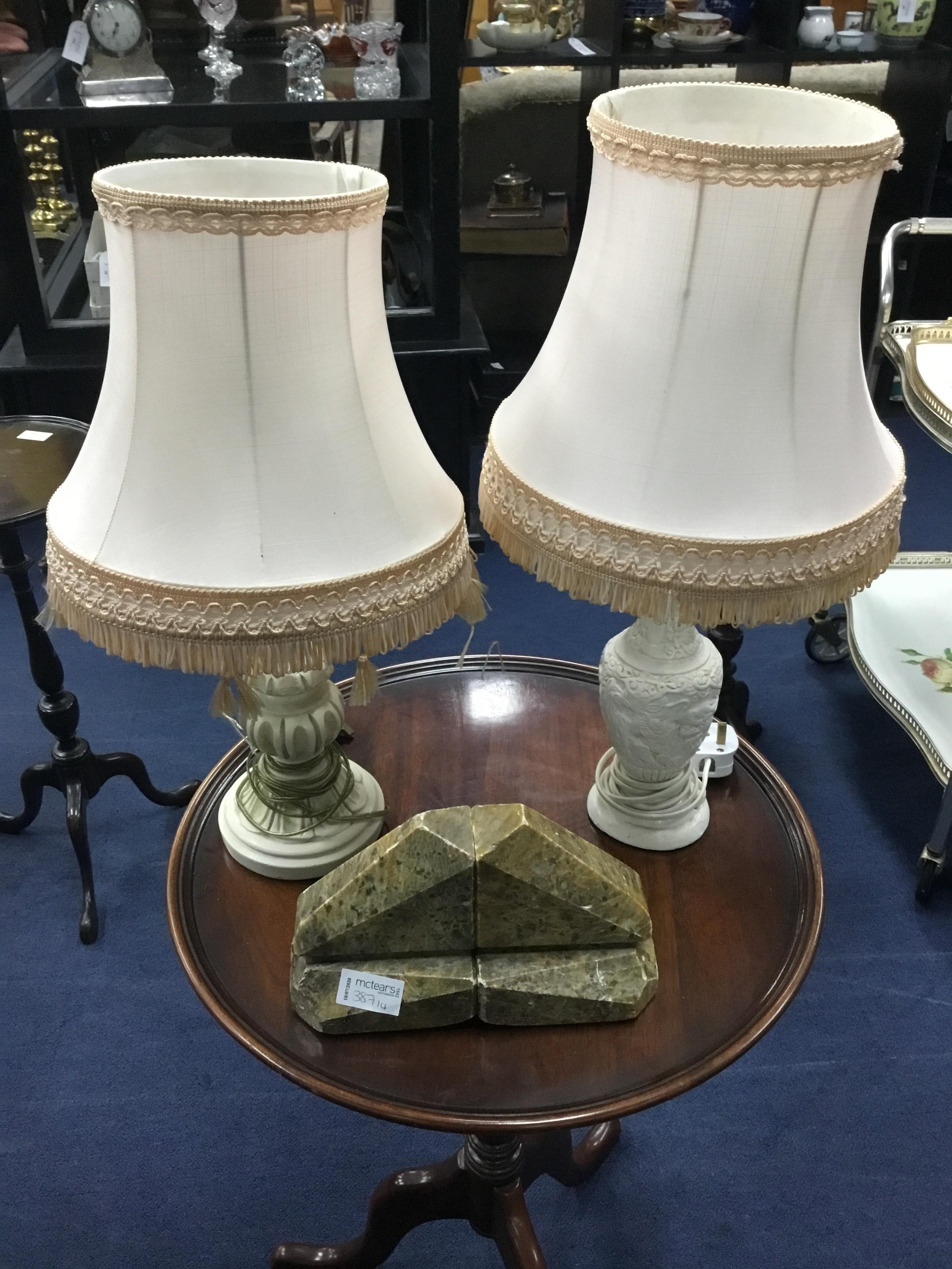 A PAIR OF MODERN BOOKENDS AND TWO TABLE LAMPS