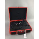 A BAUHN PORTABLE RECORD PLAYER