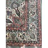 A 20TH CENTURY PERSIAN DESIGN RUG