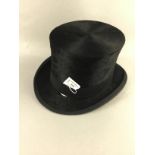 A VINTAGE BLACK FELT TOP HAT