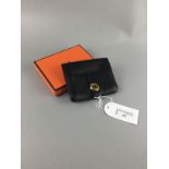 A HERMES BLACK LEATHER WALLET