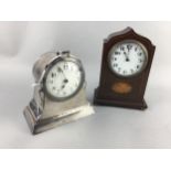 AN ART NOUVEAU BEATEN PEWTER MANTEL CLOCK ALONG WITH ANOTHER