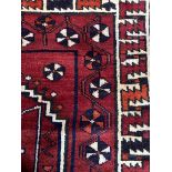 A 20TH CENTURY PERSIAN RUG