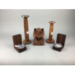 A PAIR OF IRISH BOOKENDS, TWO CANDLESTICKS AND A FIGURE