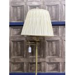 A BRASS FLOOR LAMP