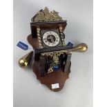 A REPRODUCTION DUTCH STYLE WALL CLOCK
