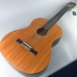 A HOHNER MODEL MC-05 SIX STRING ACOUSTIC GUITAR