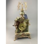 A REPRODUCTION GILT METAL AND ONYX MANTEL CLOCK