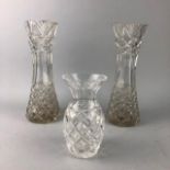 A PAIR OF EARLY 20TH CENTURY CRYSTAL VASES AND ANOTHER VASE