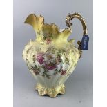 A HAND PAINTED EWER AND BASIN