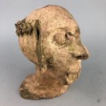 A POTTERY GROTESQUE BUST