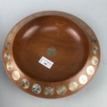 A COIN ENCRUSTED BOWL AND OTHER COINS
