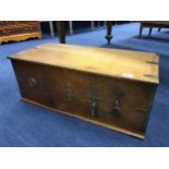 AN EARLY 20TH CENTURY OAK COLLECTOR'S CABINET