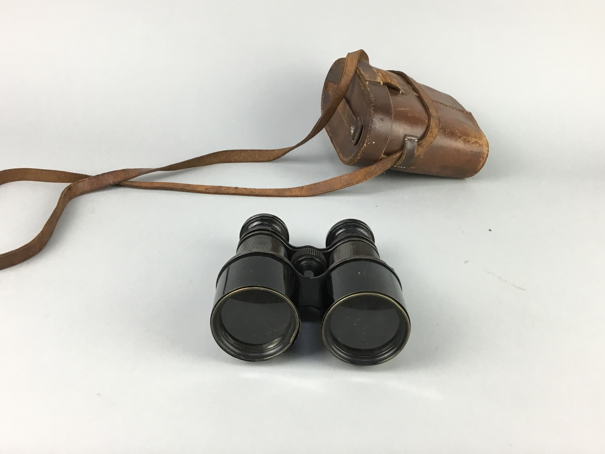 A LOT OF THREE PAIRS OF BINOCULARS