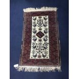 A LOT OF TWO PERSIAN PRAYER RUGS