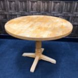 A PINE CIRCULAR DINING TABLE