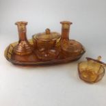 AN AMBER GLASS DRESSING TABLE SET ALONG WITH OTHER MID-CENTURY GLASS