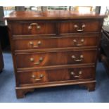 A 20TH CENTURY MAHOGANY CHEST OF DRAWERS