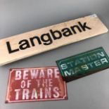 A STATION SIGN FOR LANGBANK AND TWO OTHERS