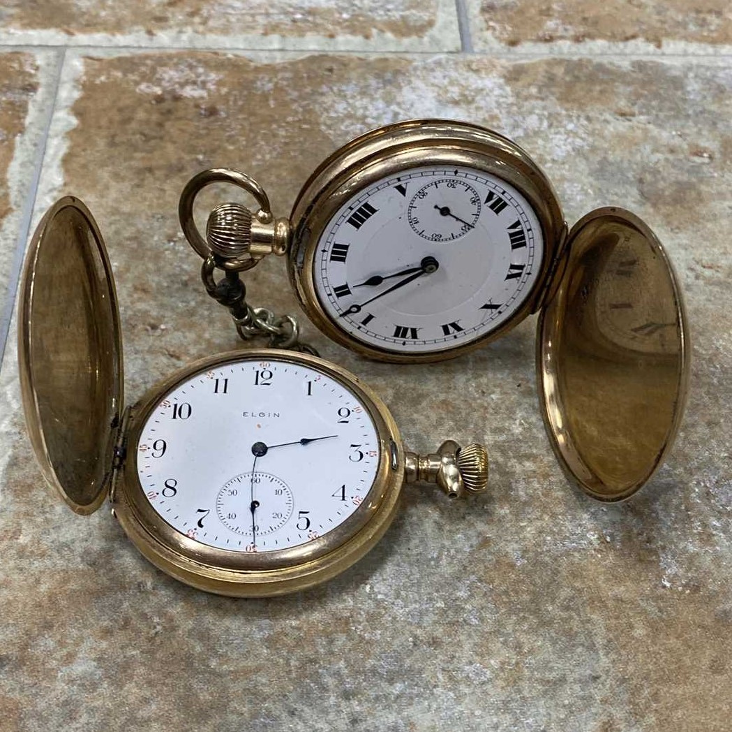 A LOT OF TWO GOLD PLATED POCKET WATCHES