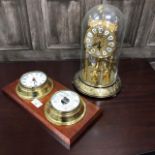 A KUNDO ANNIVERSARY CLOCK AND A BAROMETER