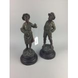 A PAIR OF SPELTER SCULPTURES OF CHILDREN ALONG WITH A BOOK, SERVING SET AND A PHOTOGRAPH