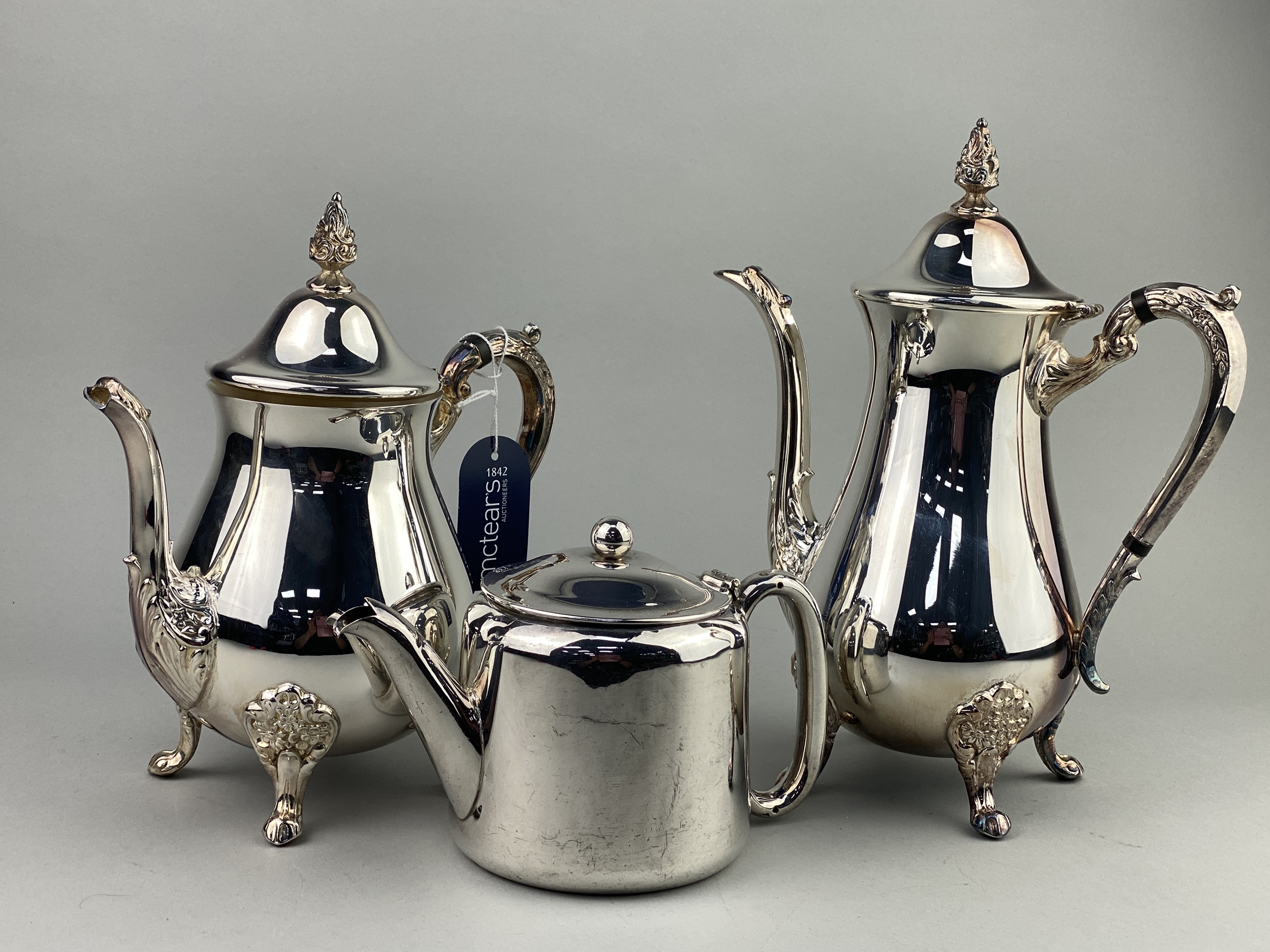 A SILVER PLATED TEA AND COFFEE SERVICE AND OTHER ITEMS