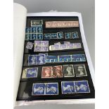 A LOT OF TWO FOLDERS OF WORLD STAMPS