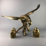 A 20TH CENTURY BRASS MODEL OF BIRD OF PREY AND TWO BRASS OWLS