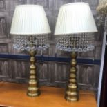 A PAIR OF BRASS ELECTRIC TABLE LAMPS