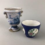 A BLUE AND WHITE VASE AND A TEA BOWL