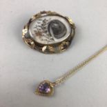 A VICTORIAN OVAL MOURNING BROOCH AND AND PENDANT ON CHAIN