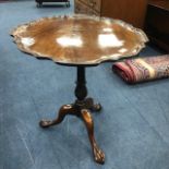 A MAHOGANY CIRCULAR OCCASIONAL TABLE