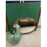 A FOLDING CARD TABLE, AN OVAL WALL MIRROR AND A CARBOY