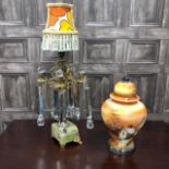 A BRASS AND ONYX ELECTRIC LAMP AND A CERAMIC LIDDED VASE